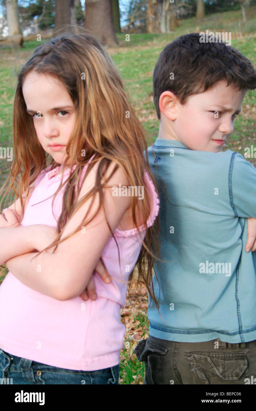 two children refusing to play angry with each other Stock Photo