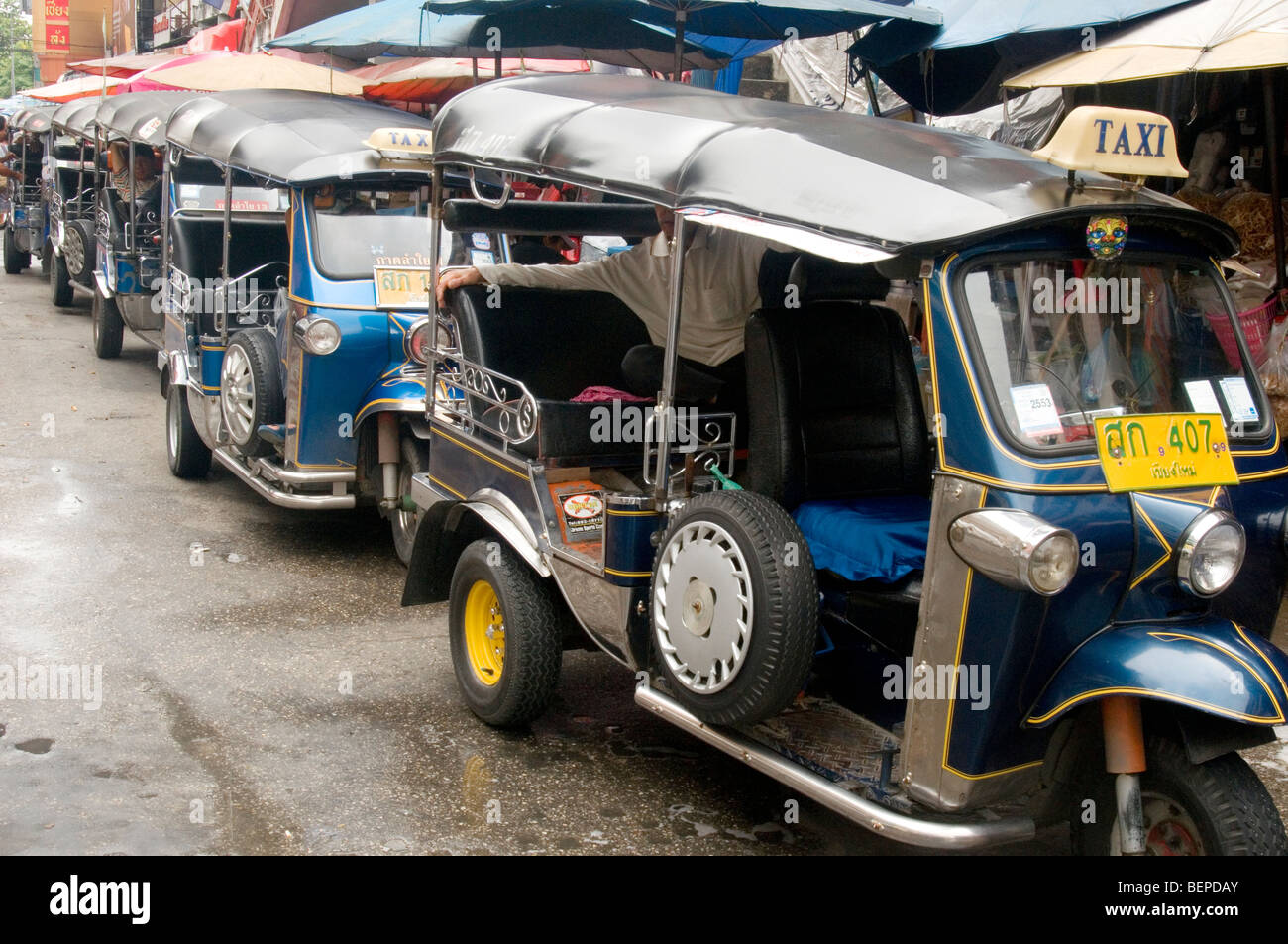 Row of tuktuks, Chiang Mai, Thailand Stock Photo