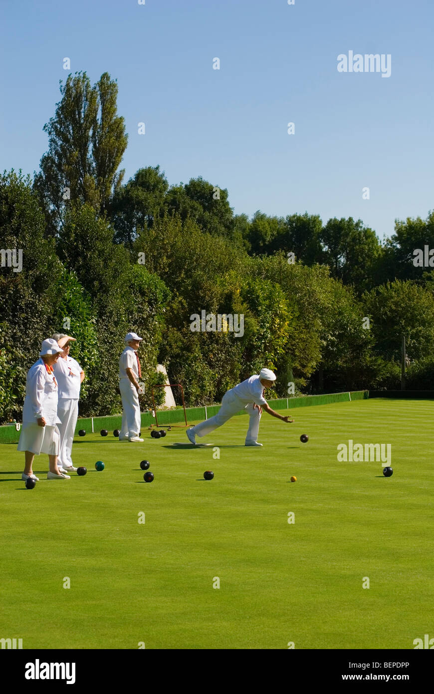 Members of the Avon Bowls Club bowling at the recreation ground Stratford-upon-Avon Stock Photo