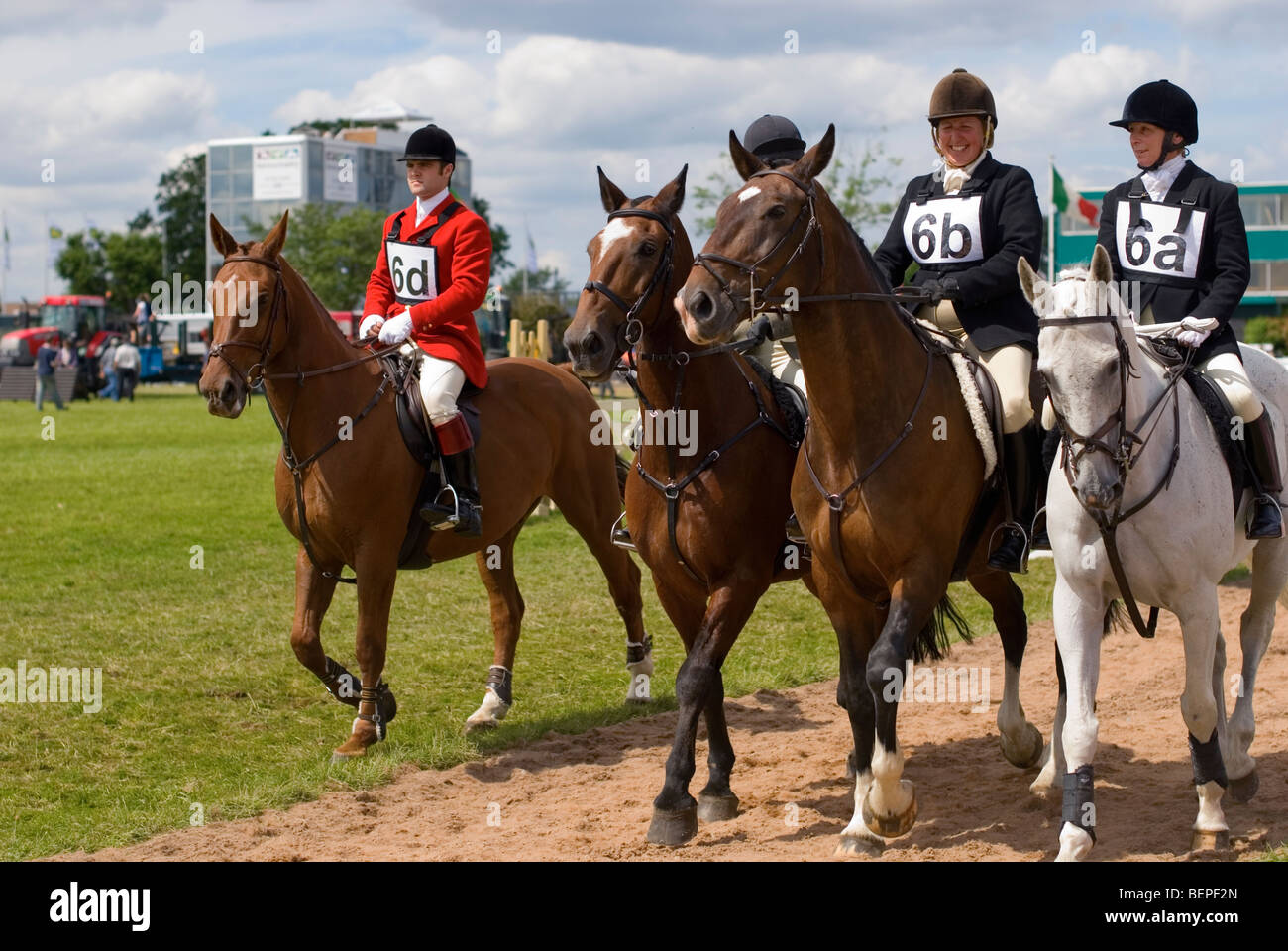 Four Show Jumpers riding on horses at the Royal Show Stock Photo Alamy