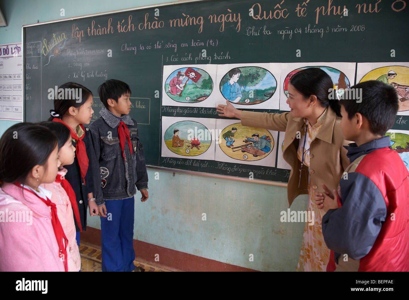 VVIETNAM Mine or unexploded bomb risk education program in Tan Hop primary school in Quang Tri Province. Stock Photo