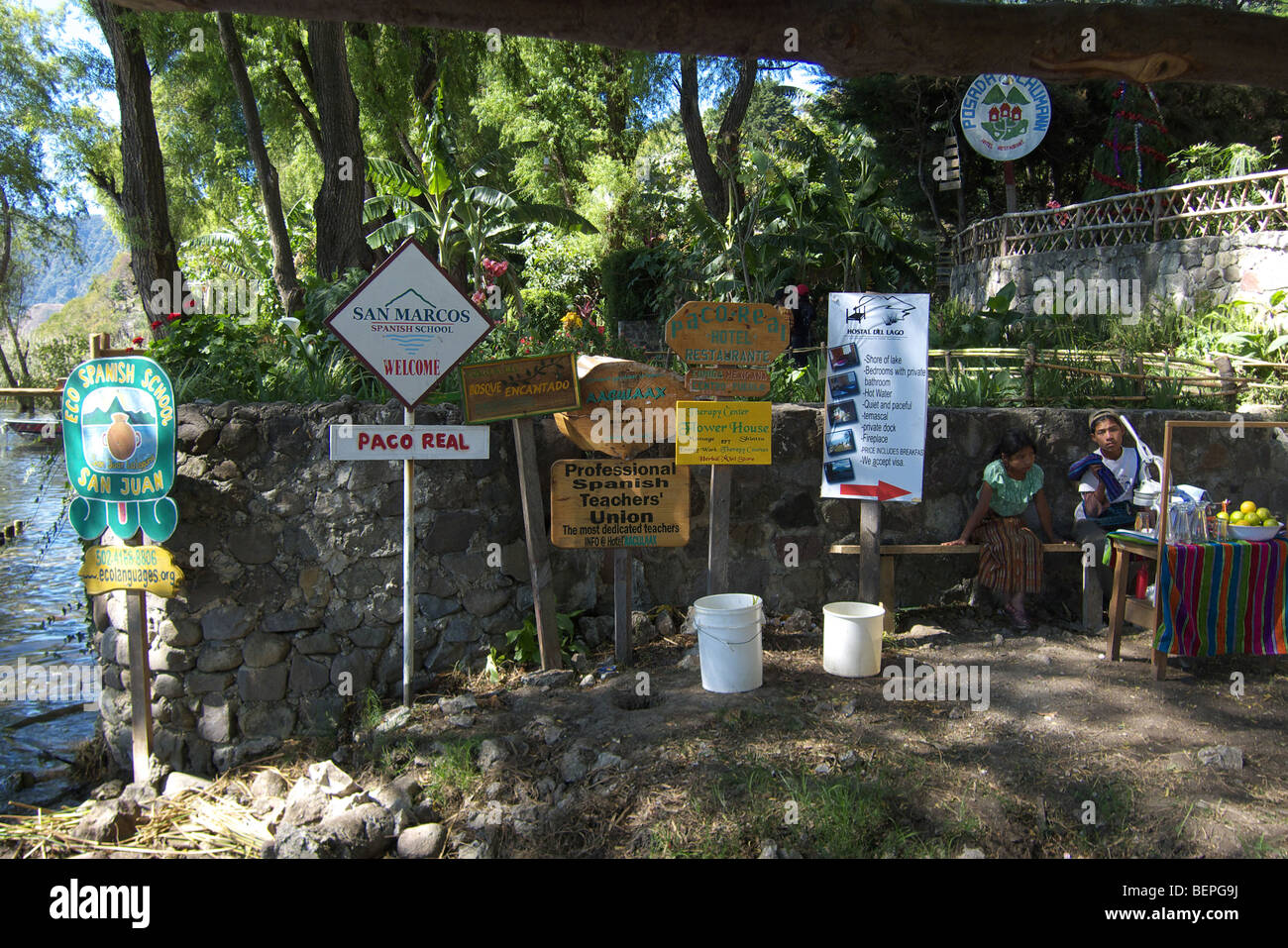 GUATEMALA Signs indicating tourist facilities at San Marcus la Laguna, on the shore of Lake Atitlan. Stock Photo