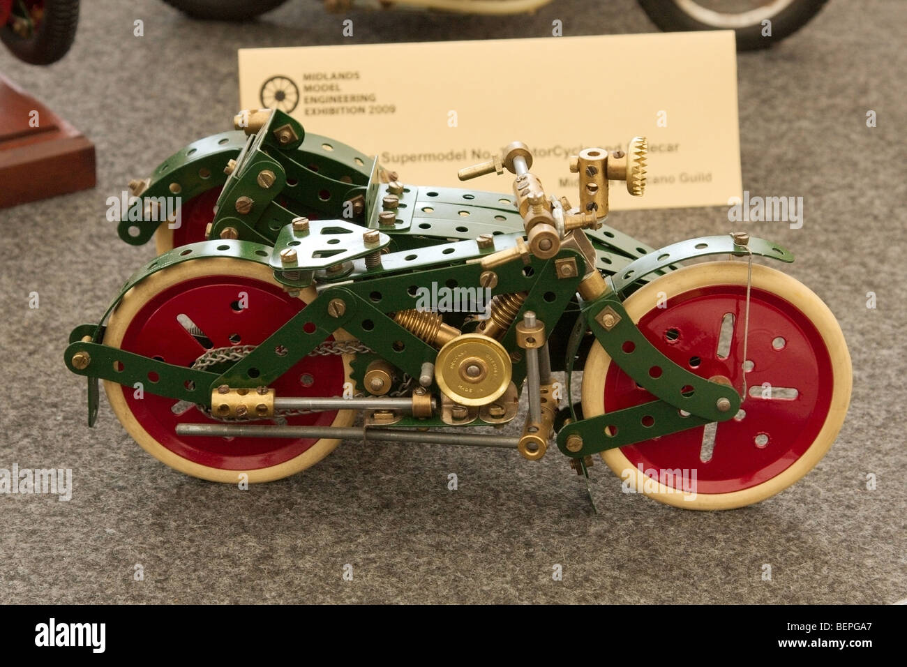 a toy motor cycle made with meccano Stock Photo