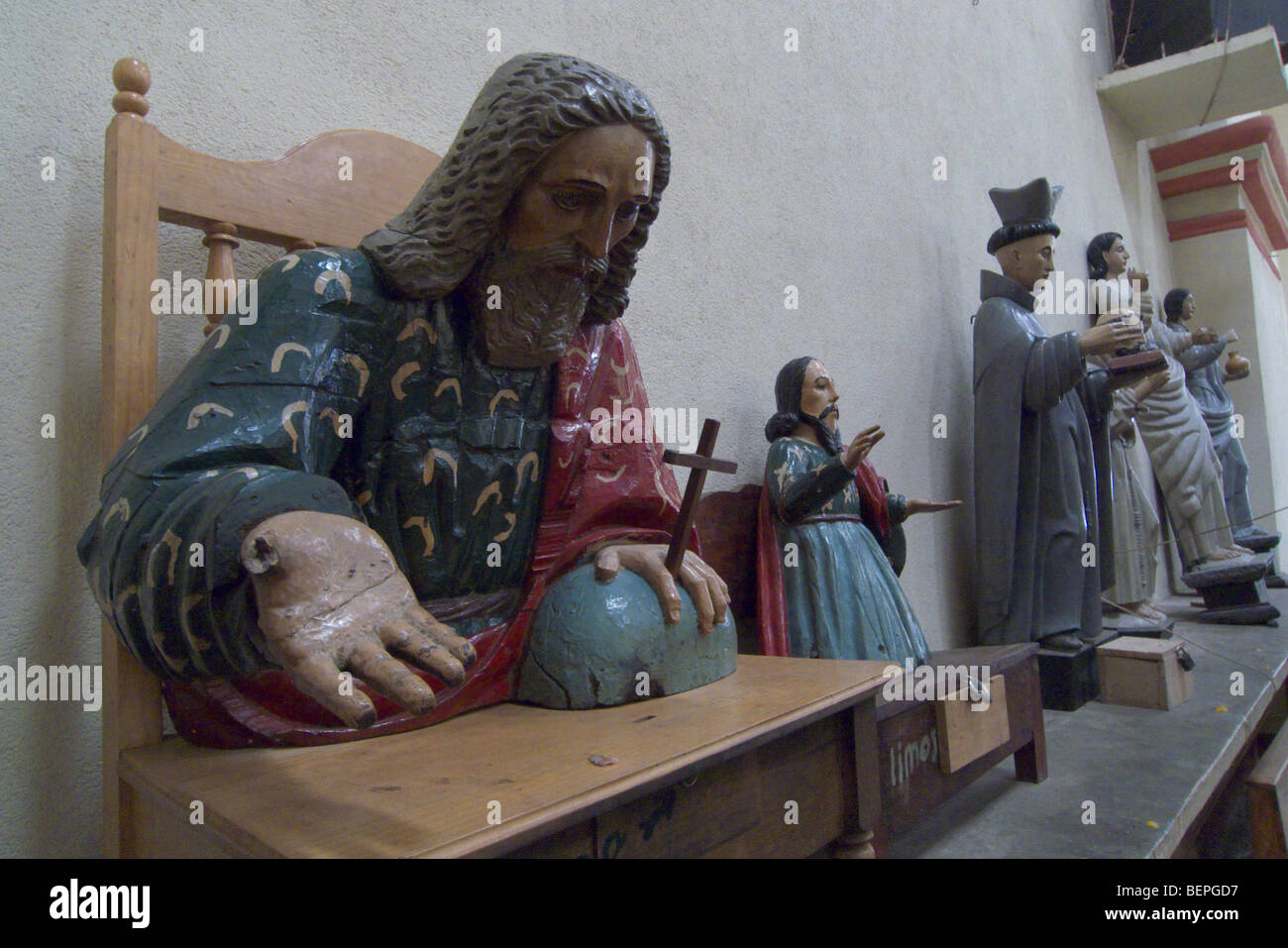 GUATEMALA Statues of Saints in the Catholic cathedral of Santiago de Atitlan. PHOTO BY SEAN SPRAGUE 2009 Stock Photo