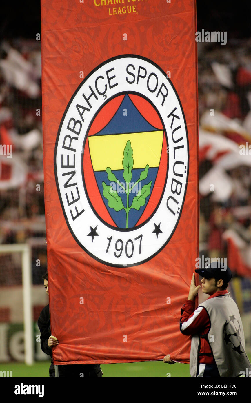 Fenerbahce badge displayed on the field before the UEFA Champions League first knockout round game (second leg) between Sevilla Stock Photo