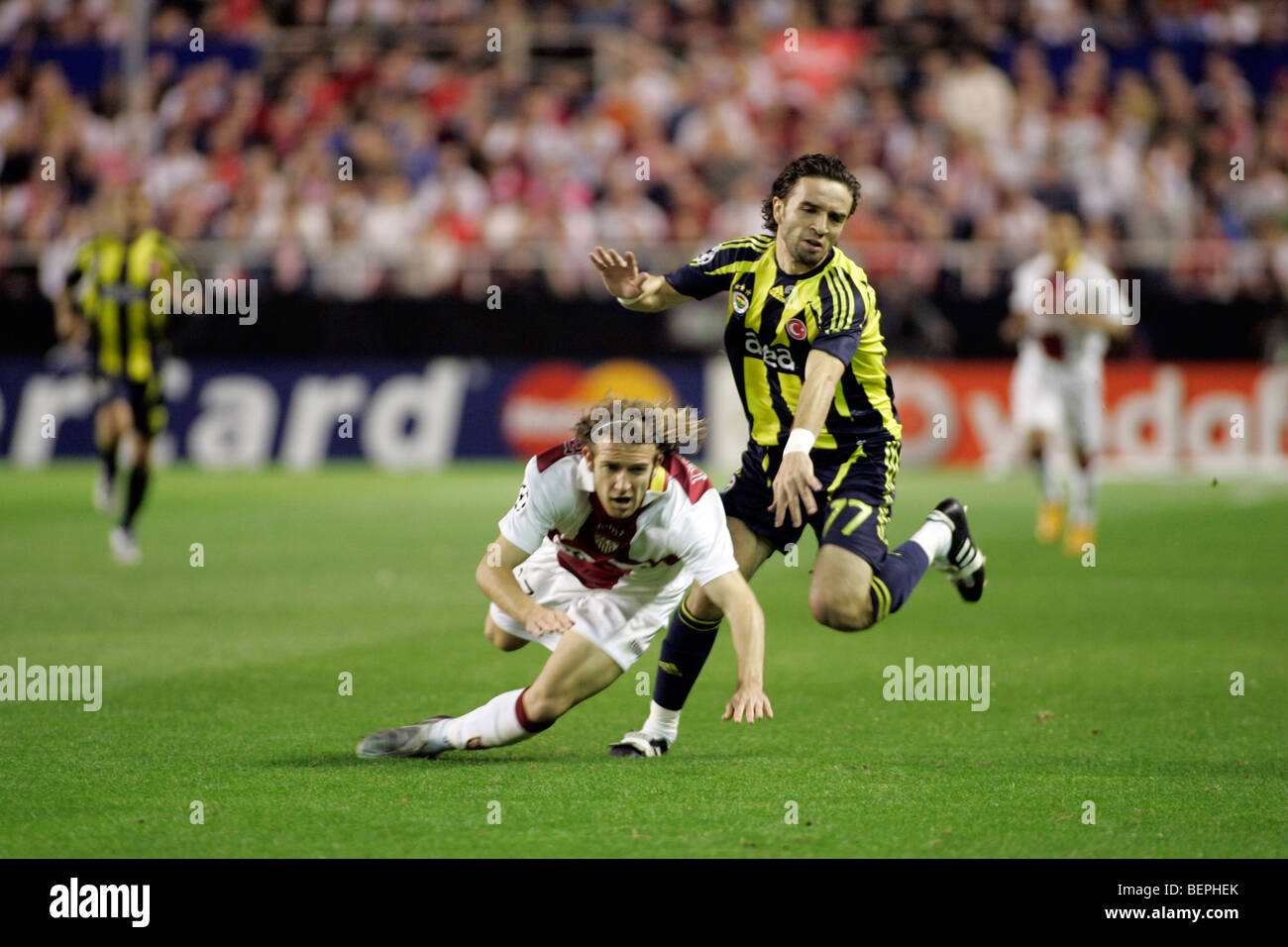 Gökhan Gönül (Fenerbahce) committing foul on Diego Capel (Sevilla) Stock Photo