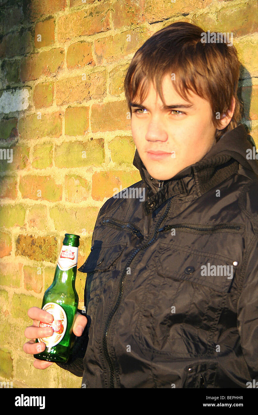 Boy drinking alcohol Stock Photo Alamy