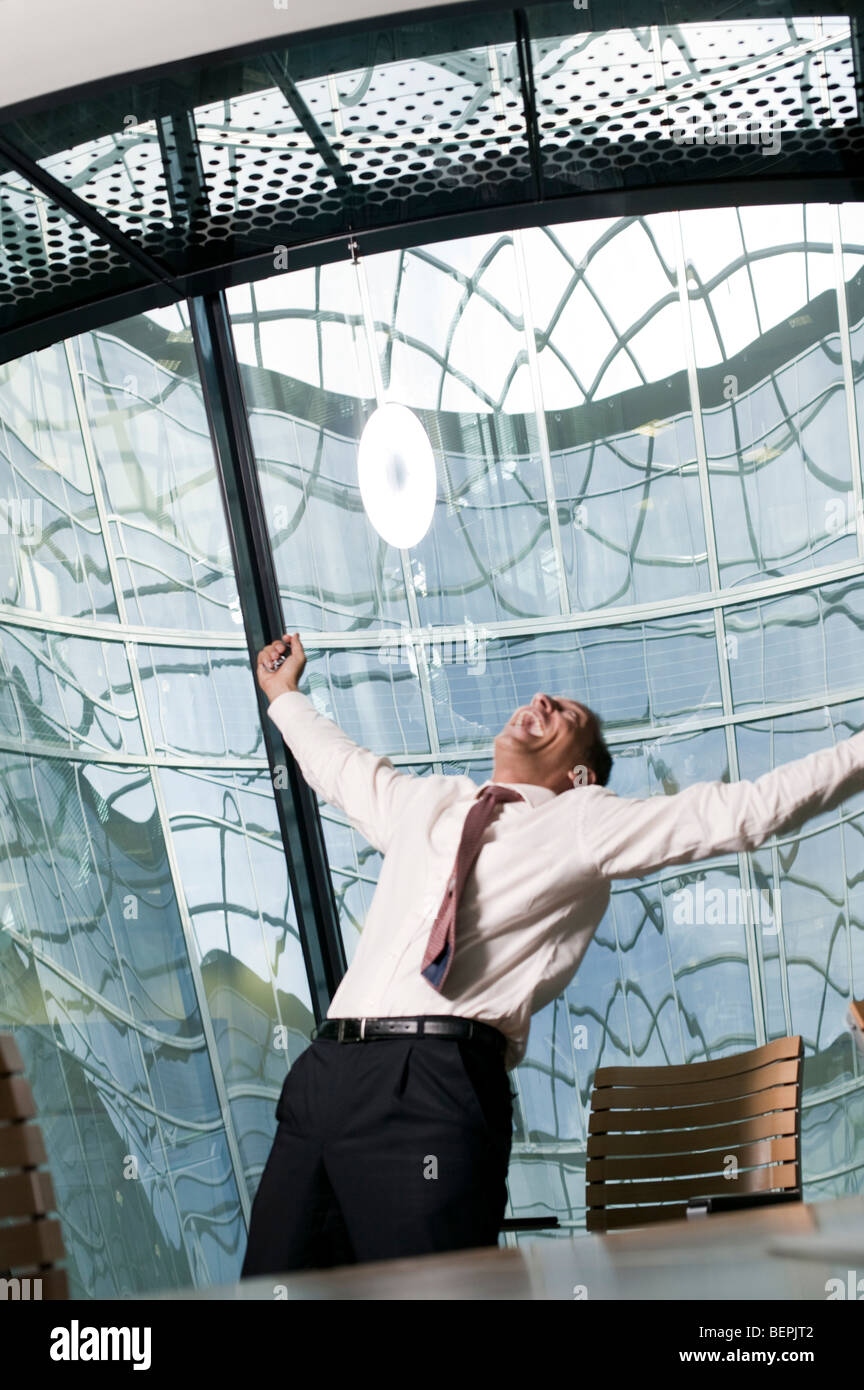 Man stretching arms upwards african hi-res stock photography and images ...