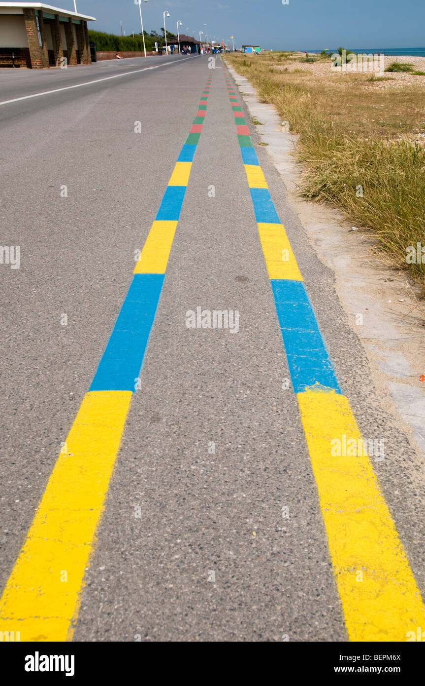 Yellow and blue road markings on seafront promenade, Littlehampton, West Sussex, UK Stock Photo