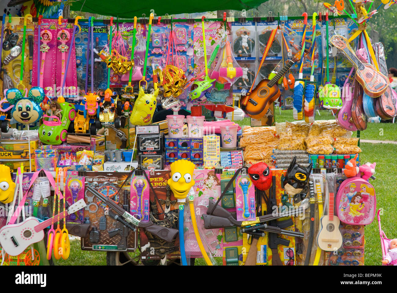 Childrens toys on stall at Spanish fiesta. Stock Photo