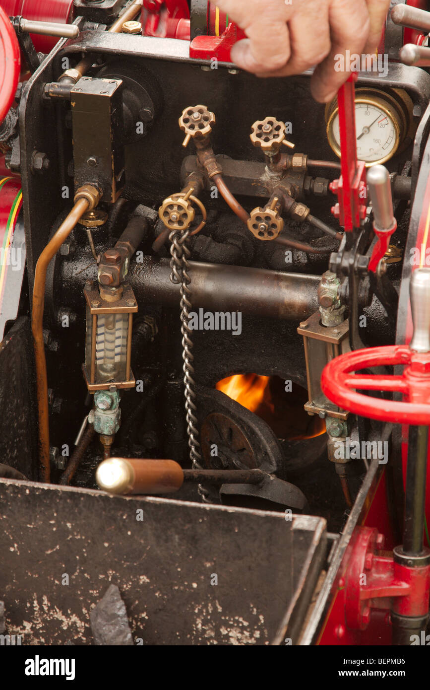 a close up image of the firebox and controls of a model traction engine Stock Photo