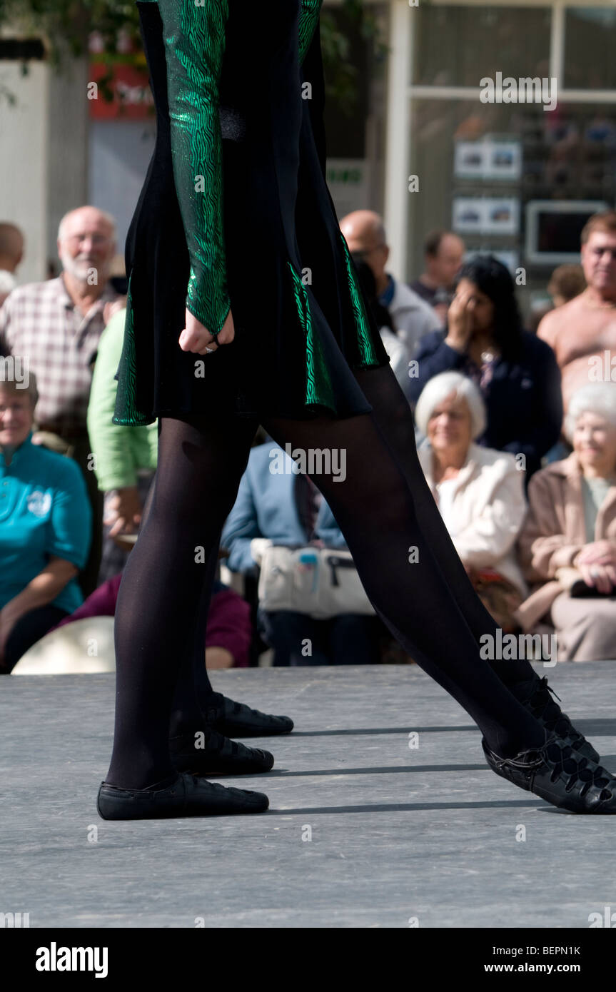Legs of Irish dancers on stage at open air Dance festival Derbyshire England Stock Photo
