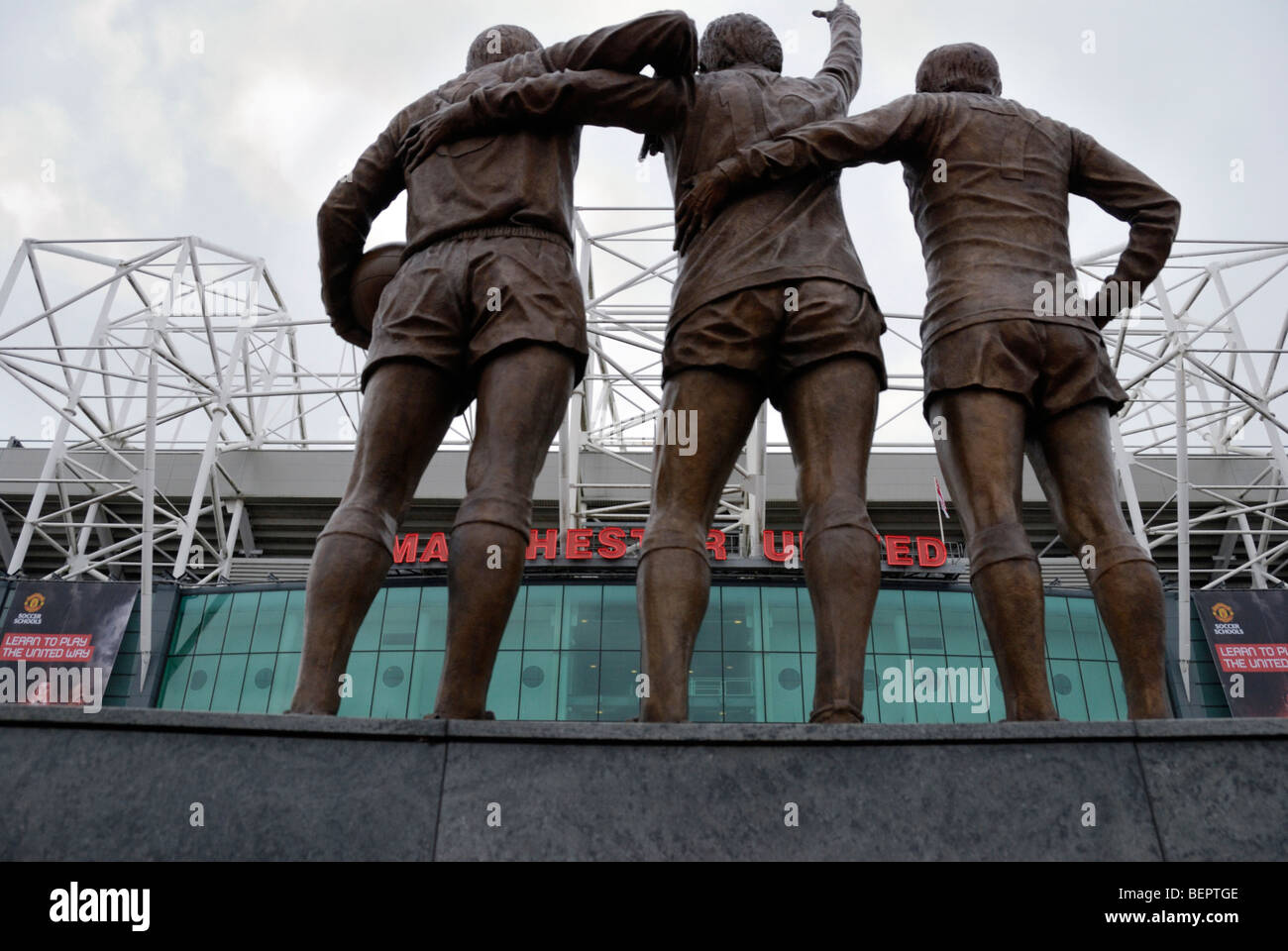The United Trinity sculpture outside Manchester United Old Trafford football stadium Stock Photo