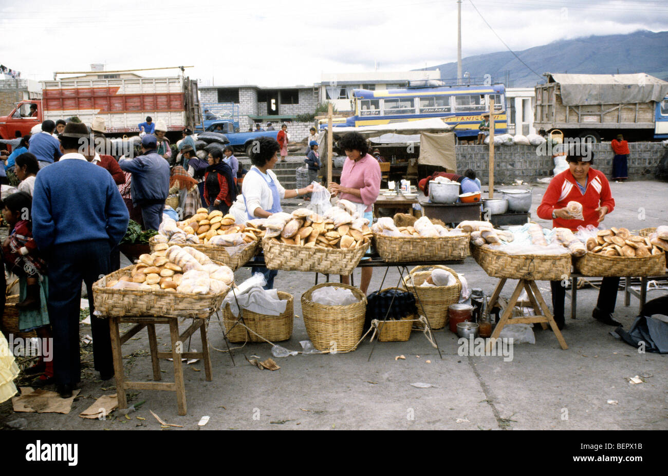 Bread seller  in local upland Ecuador market. Stock Photo