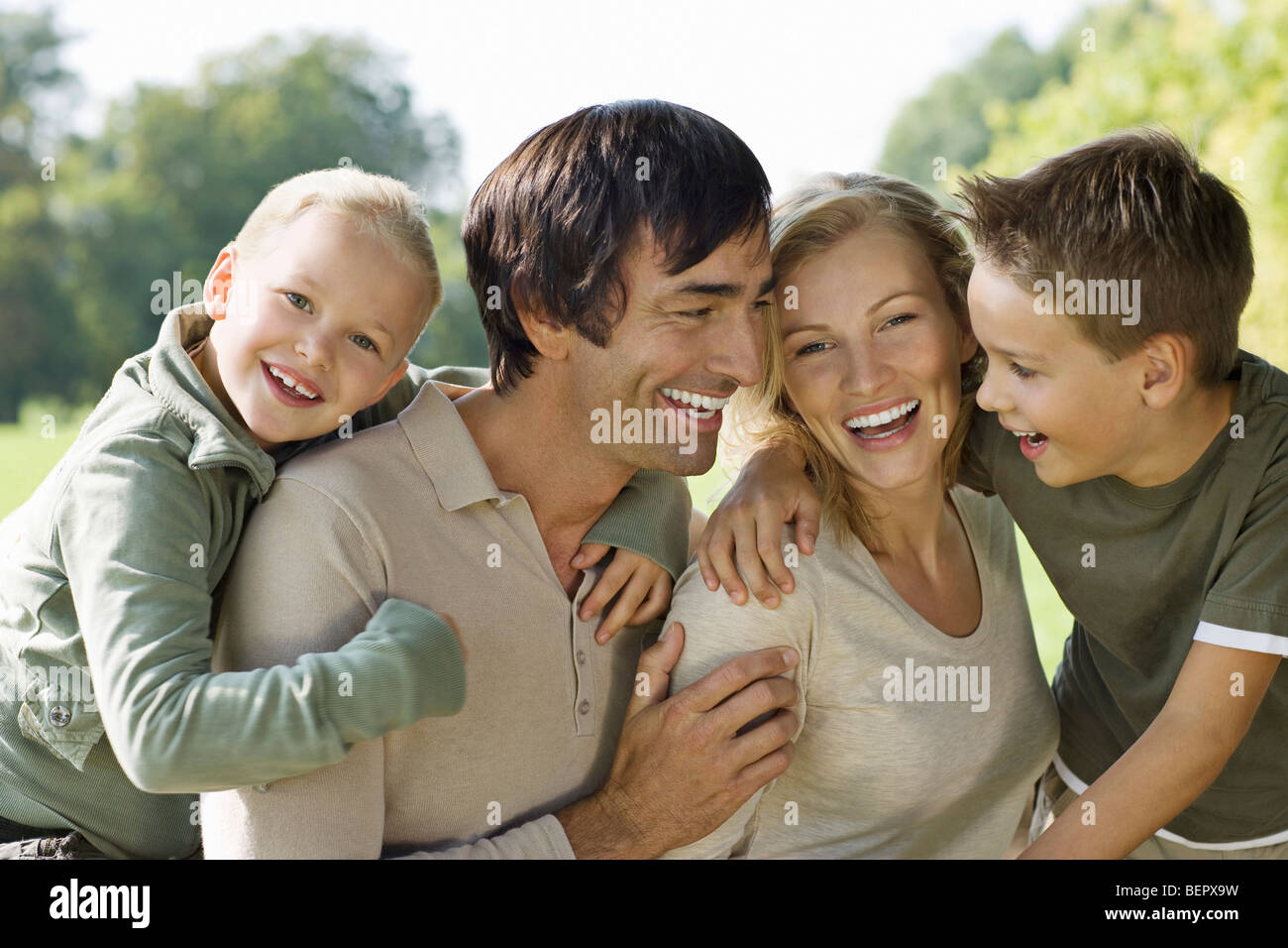 A family portrait in the park Stock Photo - Alamy