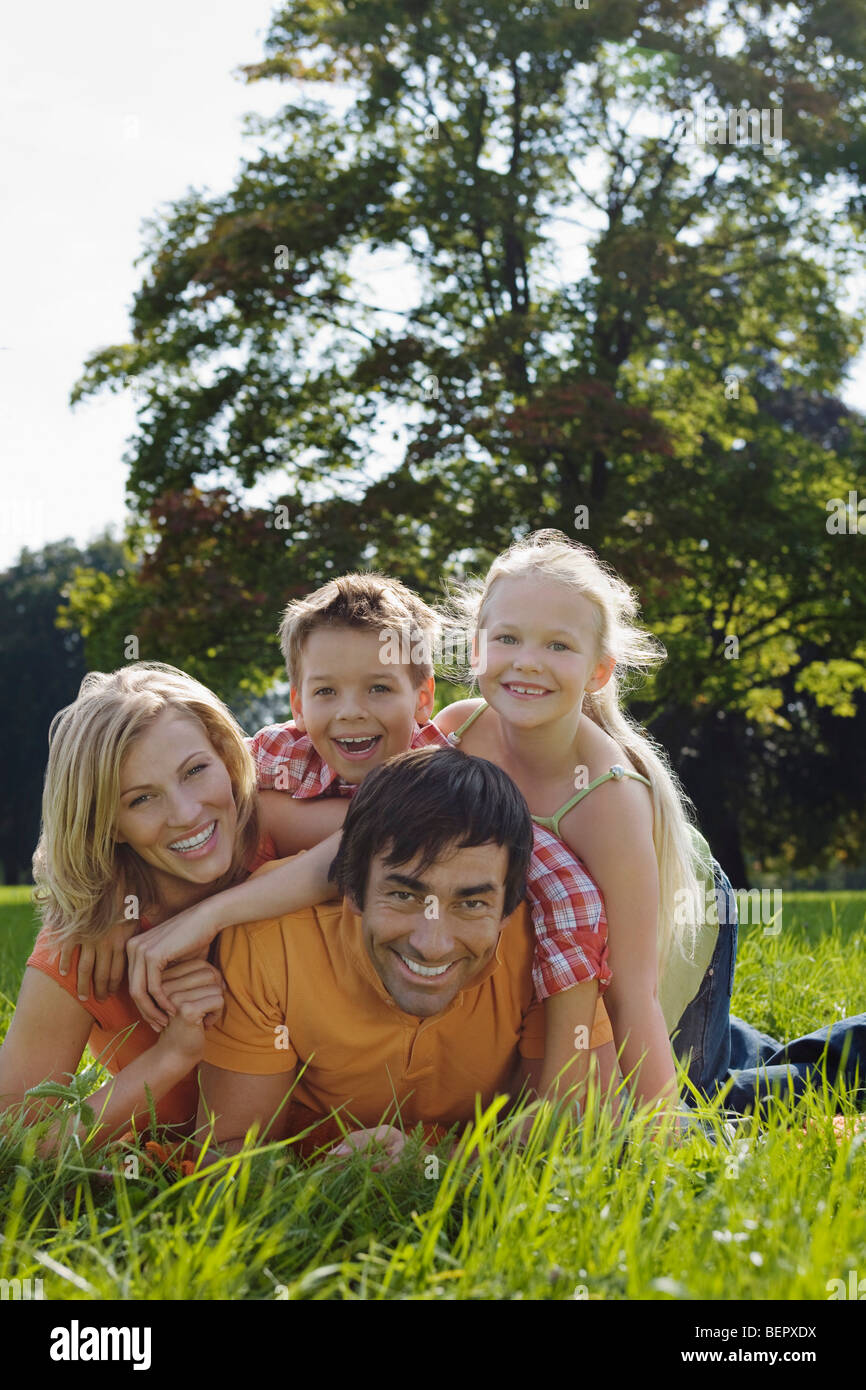 A family portrait in the park Stock Photo - Alamy
