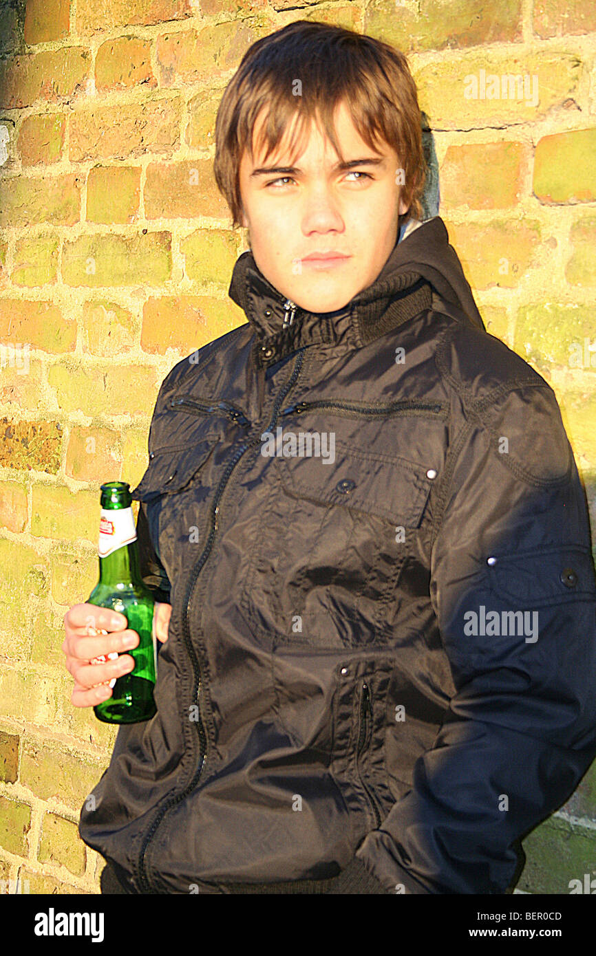 Boy drinking alcohol Stock Photo Alamy