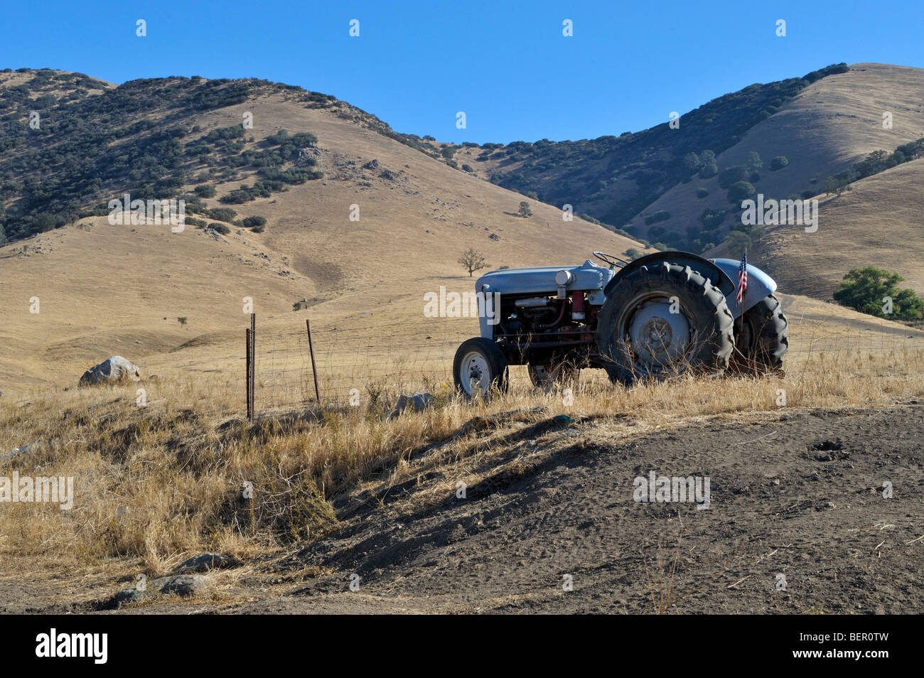 Ford Tractor on hillside 091010 34781 Stock Photo