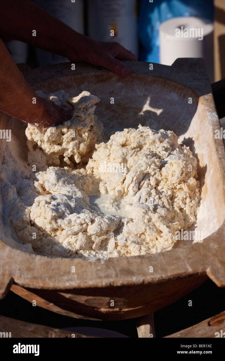 Woman [ south Alfoldi region ] [ Del Alfodi Regio South Alfoldi ]  making dough for lepeny bread. Hungary Stock Photo