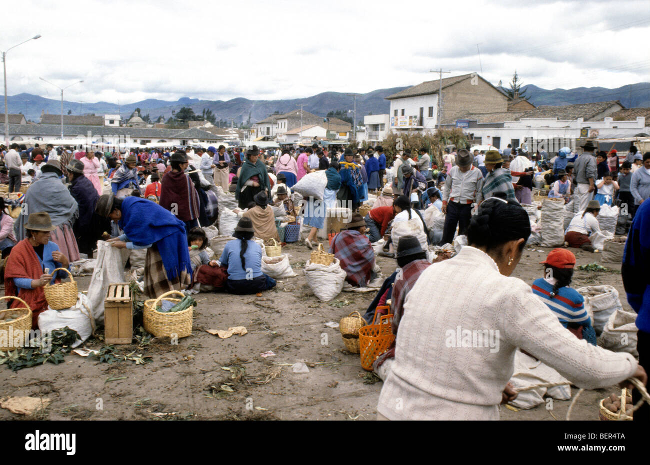 View across mass of bodies in open market square Ecuadorian Highlands. Stock Photo