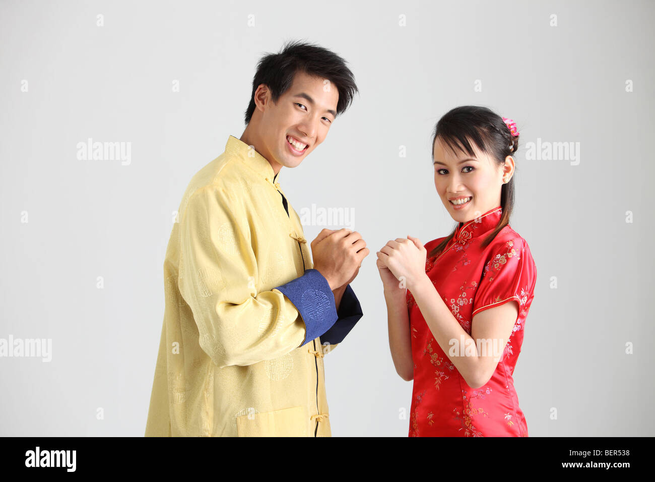 Man and woman greeting each other Stock Photo - Alamy