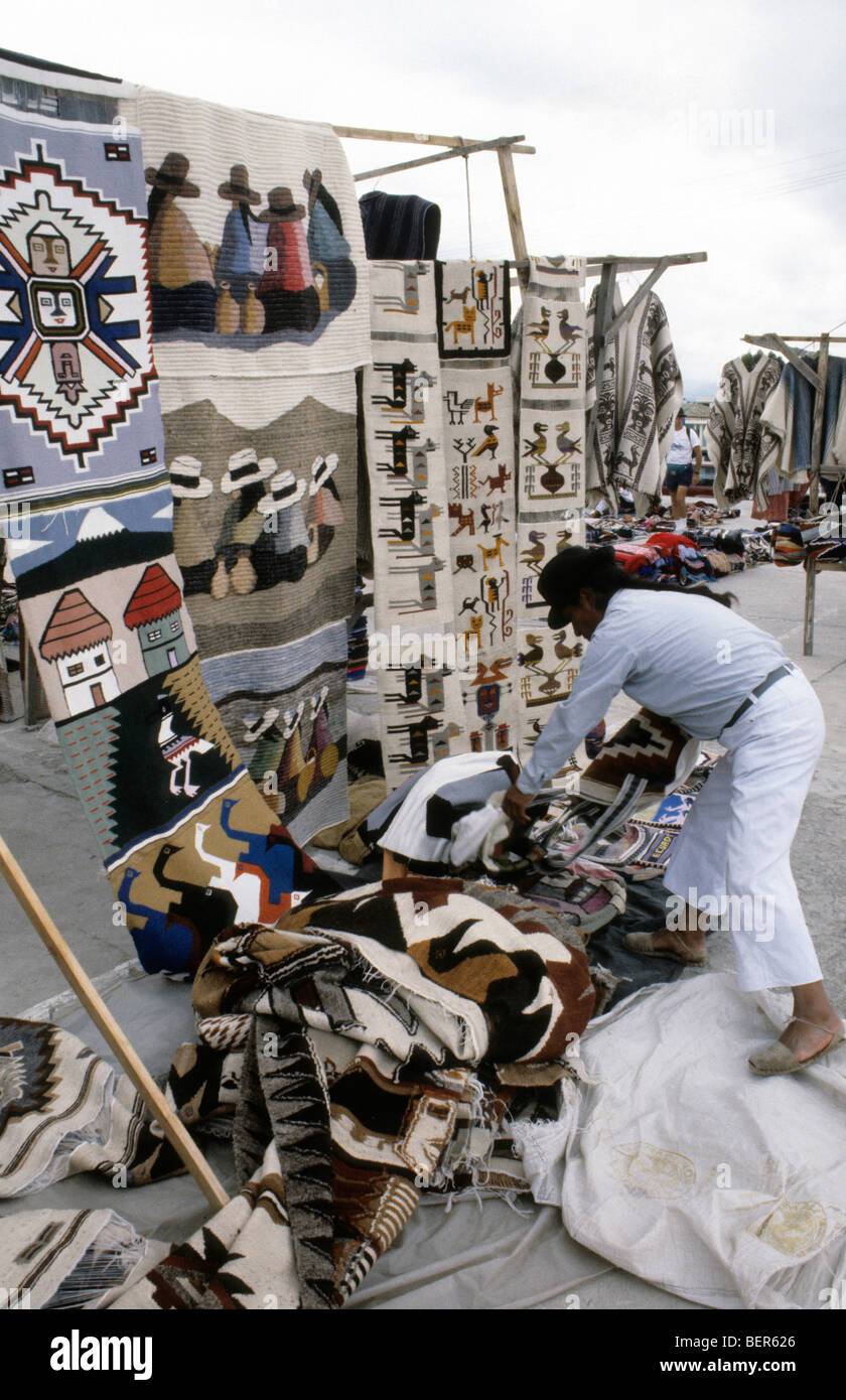 Decorative rug seller. Ecuador highlands local market. Stock Photo