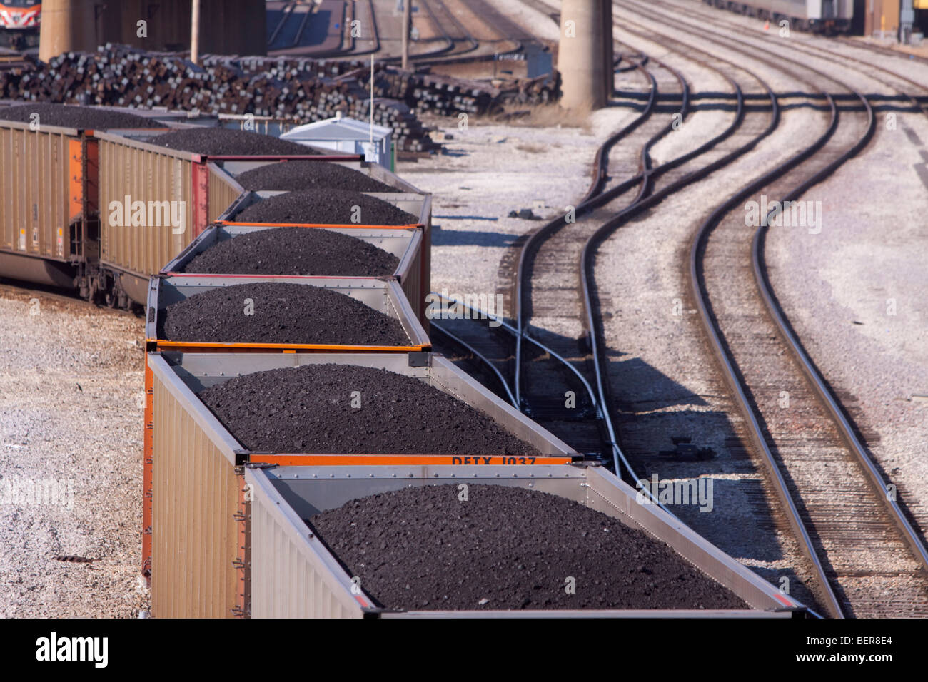 With fuel for Detroit Edison power plants, a coal train snakes through Chicago, IL. Stock Photo