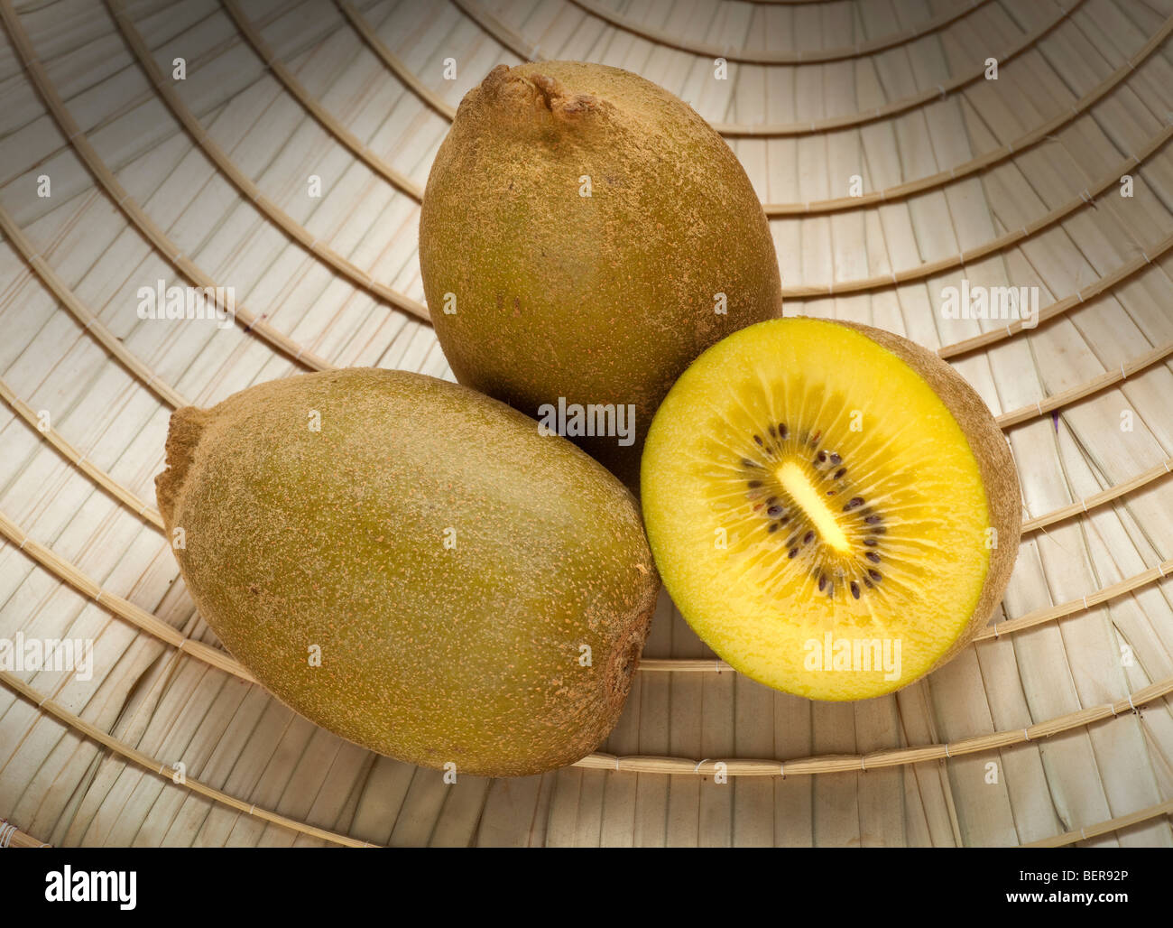 Gold Kiwifruit or 'Hinabelle cultivar, cut flesh showing interior Stock Photo