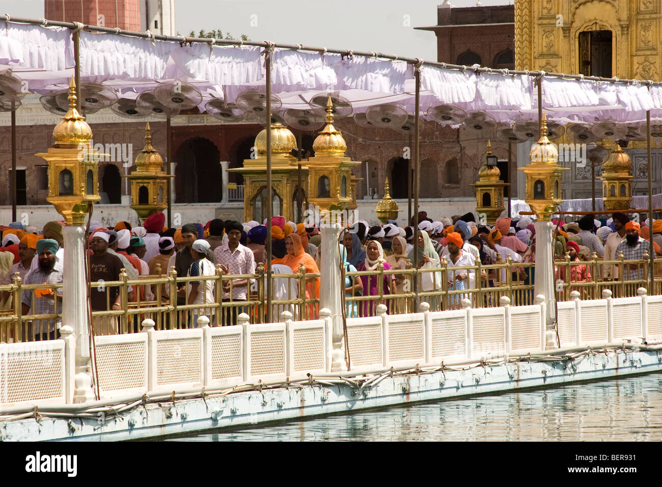 Devotees lined up to pay their respect to Guru Granth Sahib during the celebration of Diwali in Amritsar, Punjab India Stock Photo