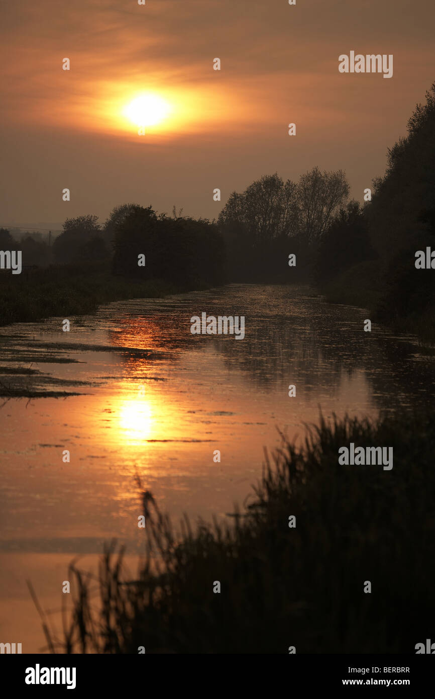Sunset over Driffield Canal, Wansford, East Yorkshire Wolds, UK Stock Photo