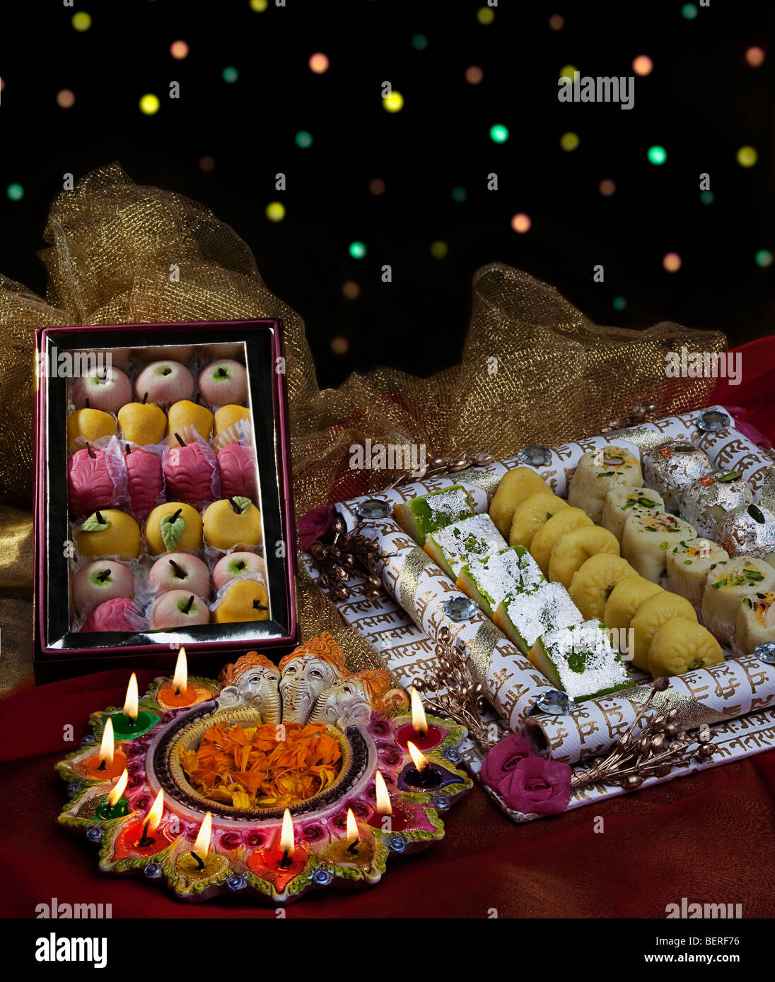 Sweet dishes with diyas Stock Photo Alamy