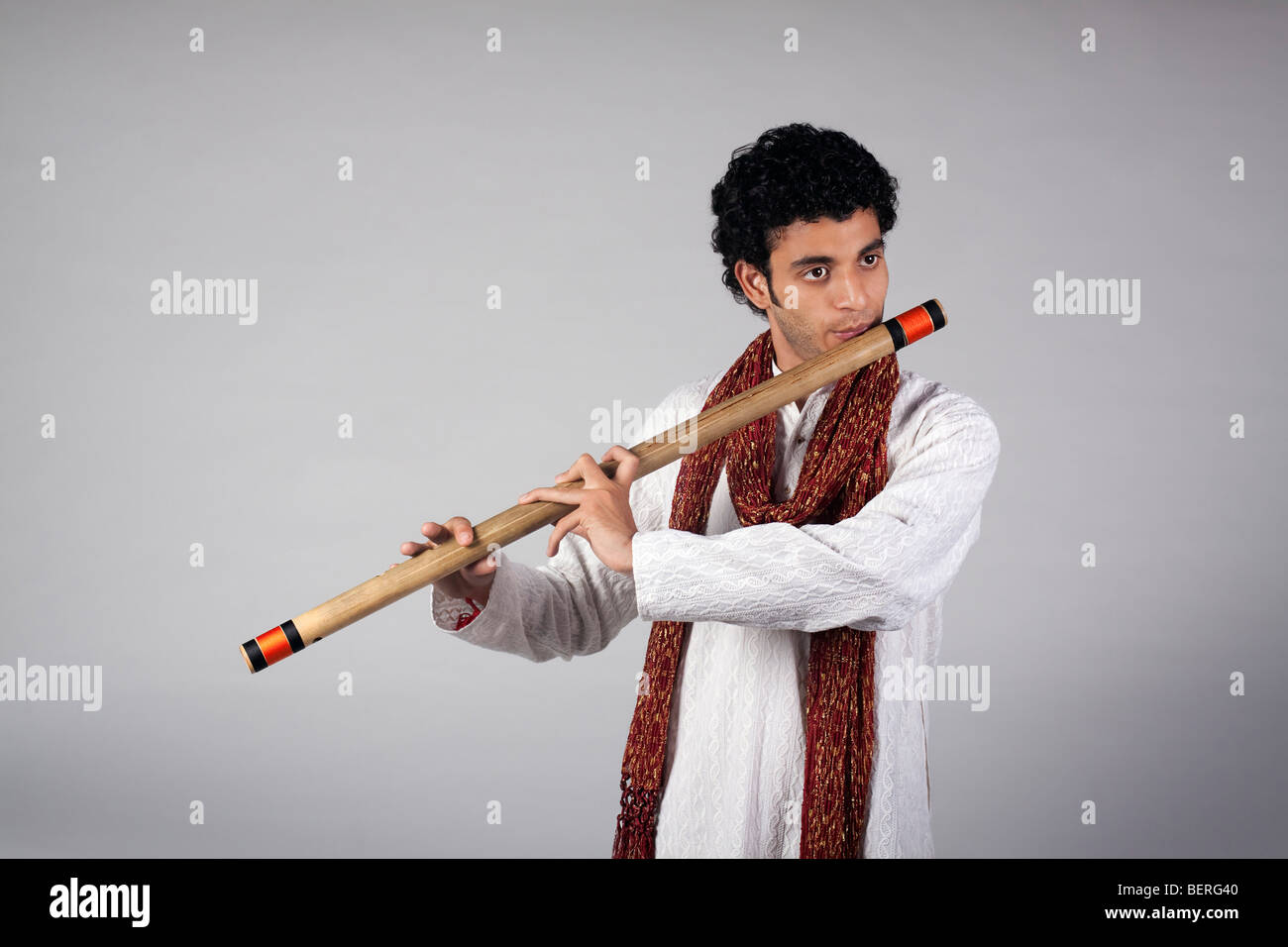 Man playing the flute Stock Photo
