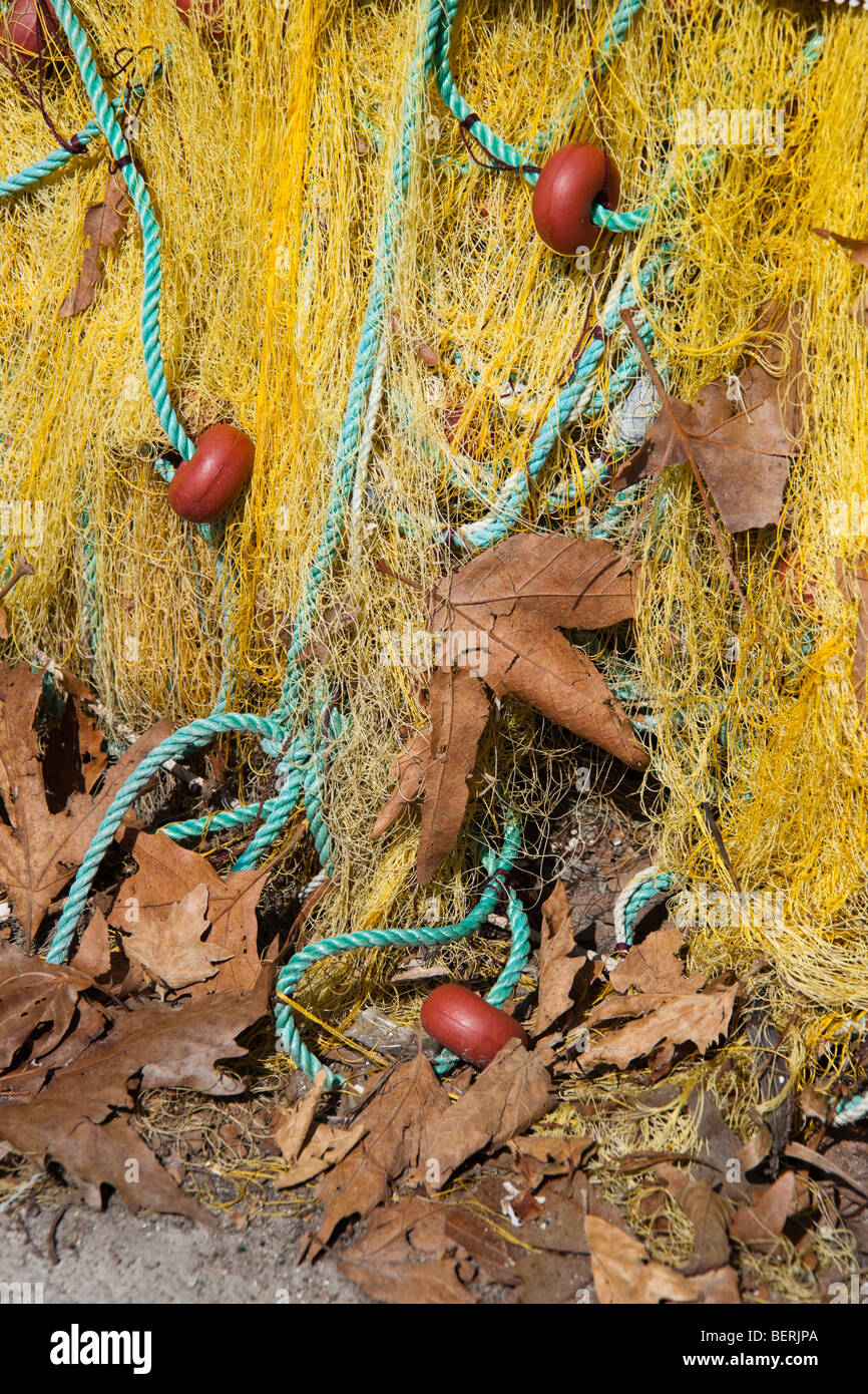 Greek fishing nets in autumn with fallen leaves Stock Photo Alamy