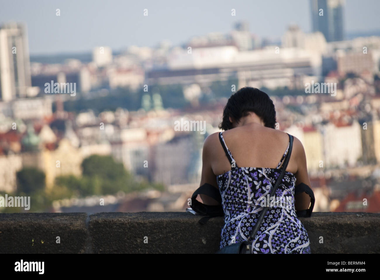 young woman look at the city from the balustrade Stock Photo
