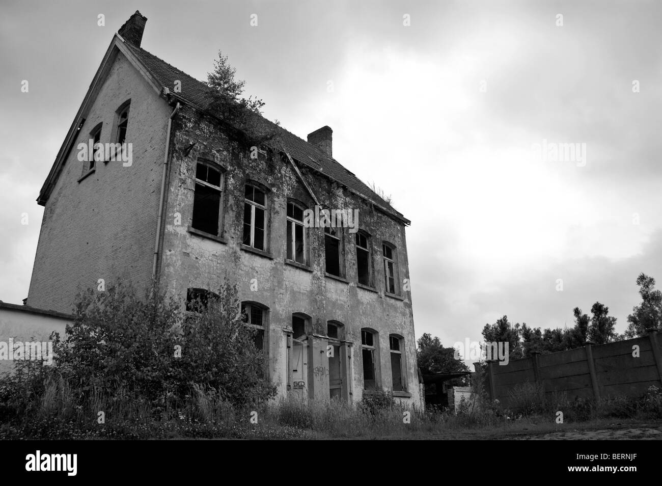 Dilapidated house on industrial estate, Antwerp, Belgium Stock Photo