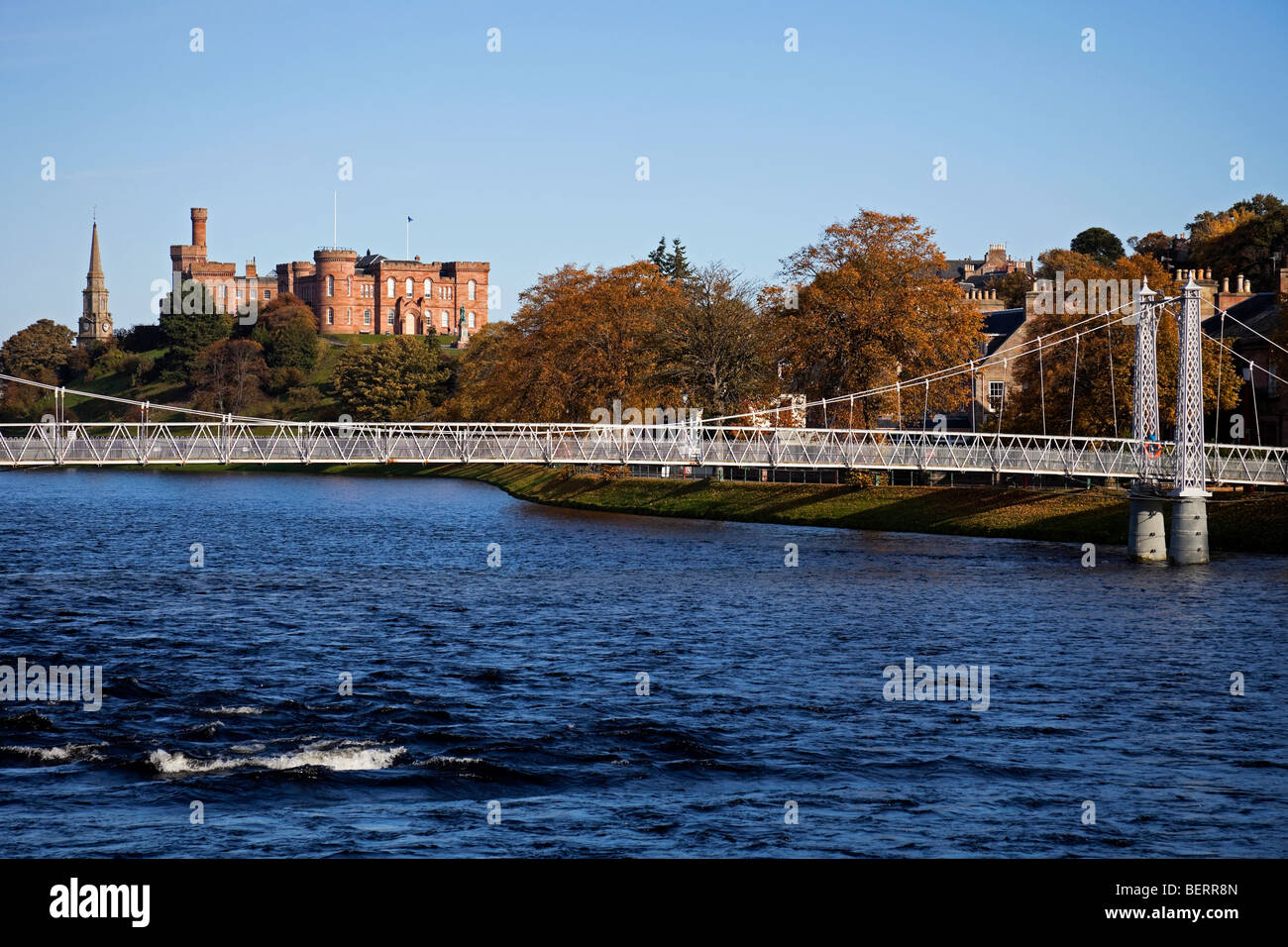 Footbridge spanning the River Ness, with Inverness Castle in background Inverness-shire, Scotland UK Europe Stock Photo