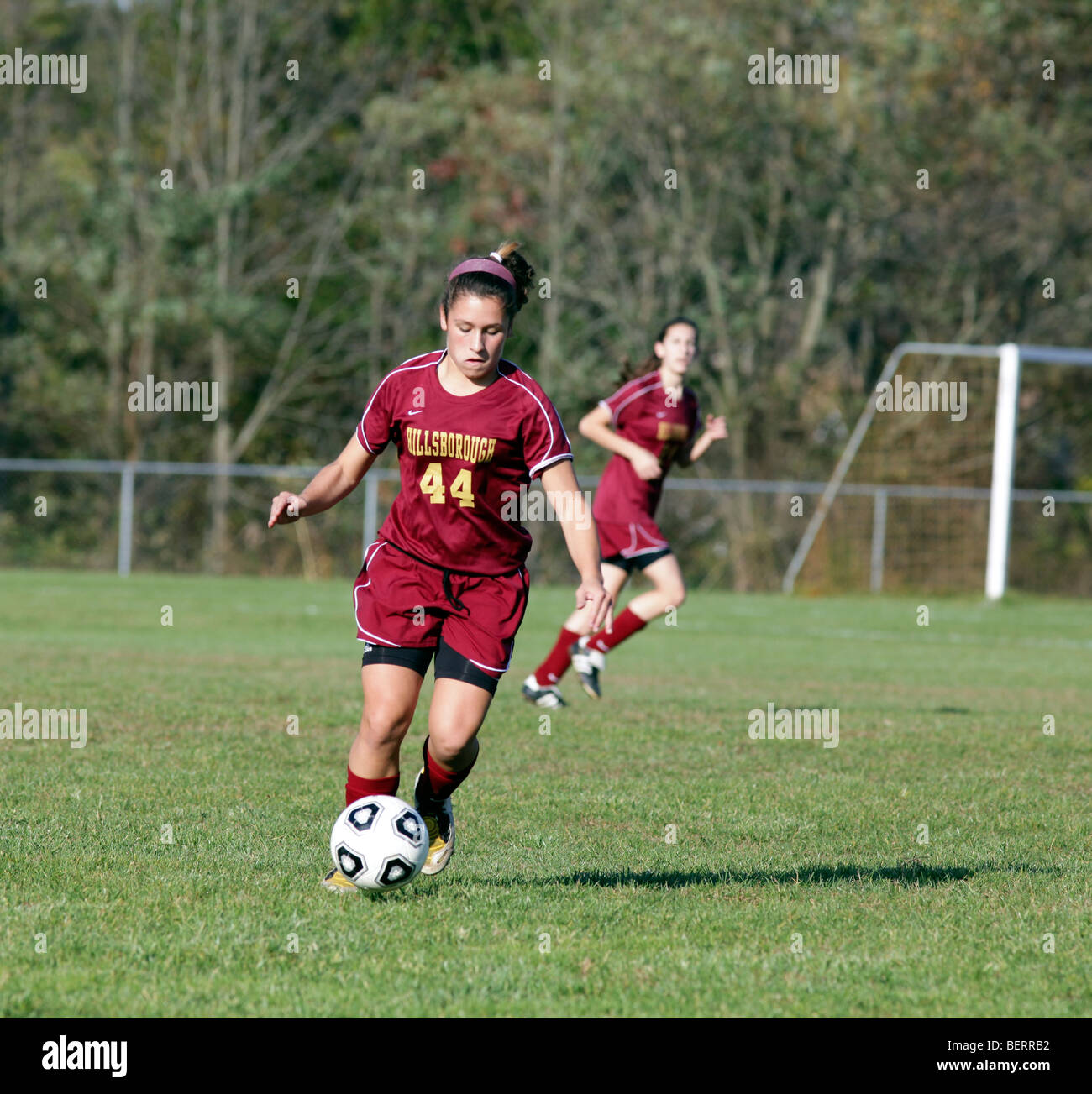 Teenage Girls Playing High School Soccer Football Stock Photo Alamy
