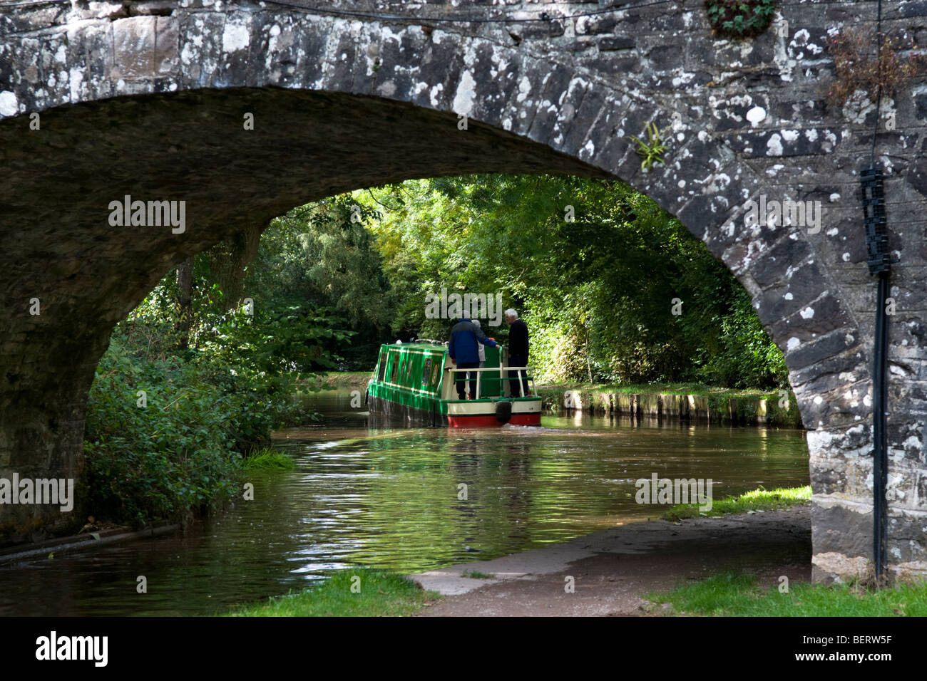 Canal boat saling on the Monmouth and Brecon Canal taken at Llangynidr mid Wales on fine day Stock Photo