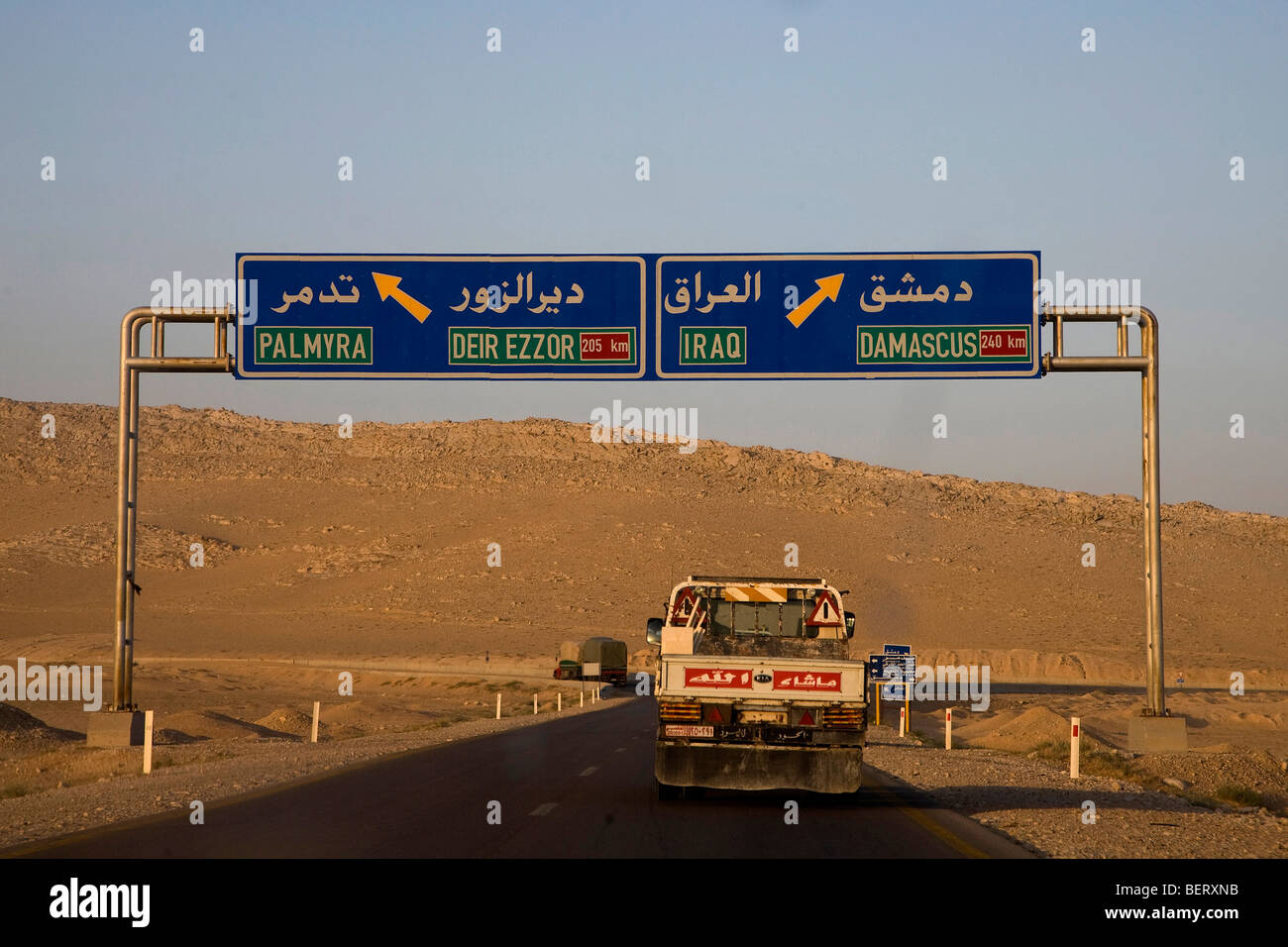 Driving Directions To The Nearest Car In The Desert Near Palmyra, Syria, Middle East, Asia. Sign And Driving  Directions To Iraq And Damascus Stock Photo - Alamy