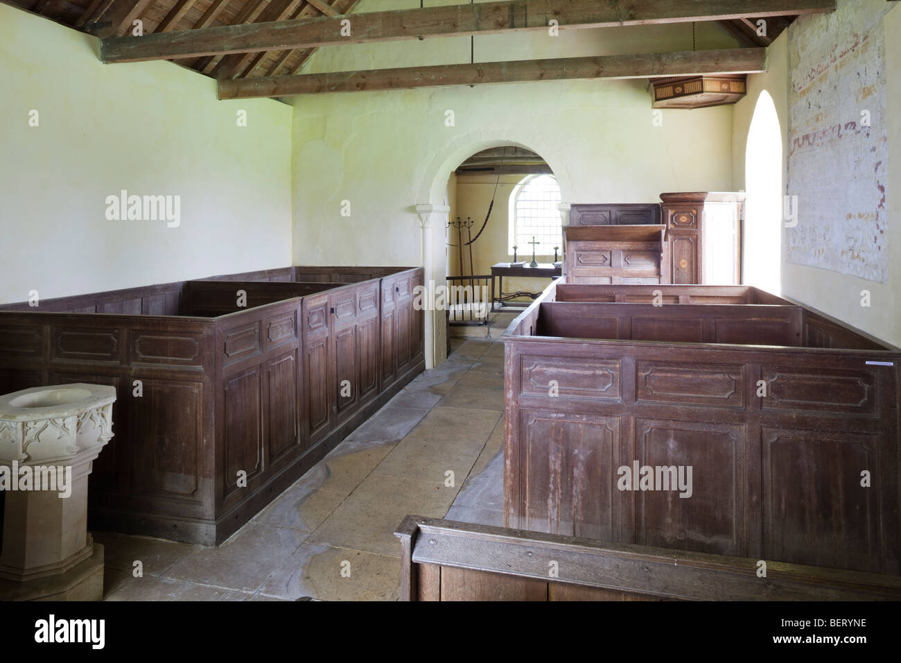 The interior of the 12th century church of St Mary at Little Washbourne, Gloucestershire Stock Photo