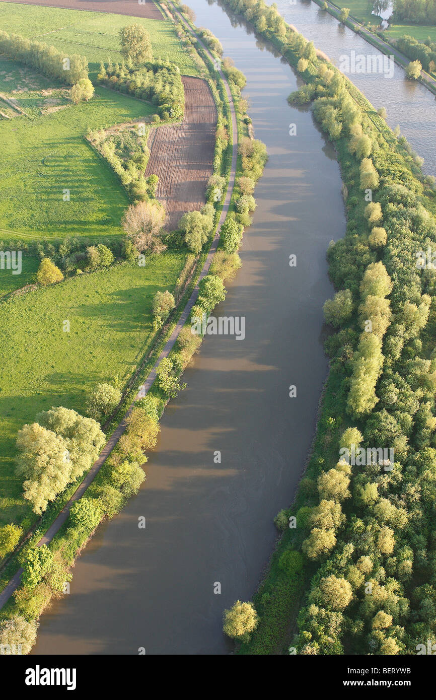 Fields, grasslands, forested area along river Scheldt from the air, valley of Scheldt, Belgium Stock Photo