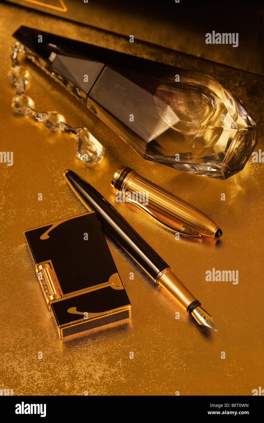 Man still life with the cologne and the fountain pen Stock Photo