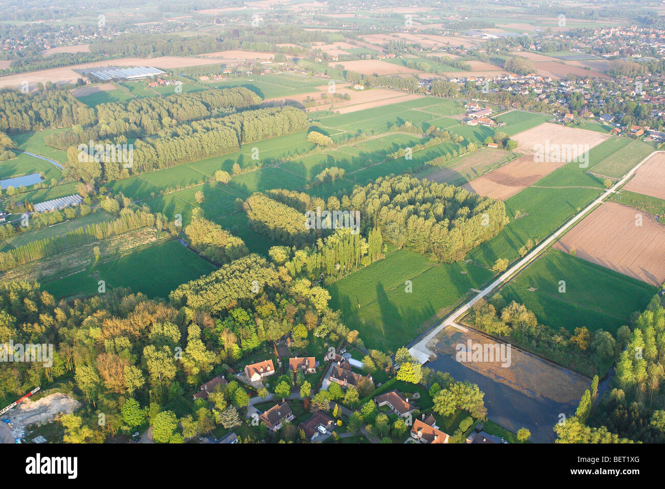 Castle, urbanisation at the border of agricultural area from the air, Belgium Stock Photo