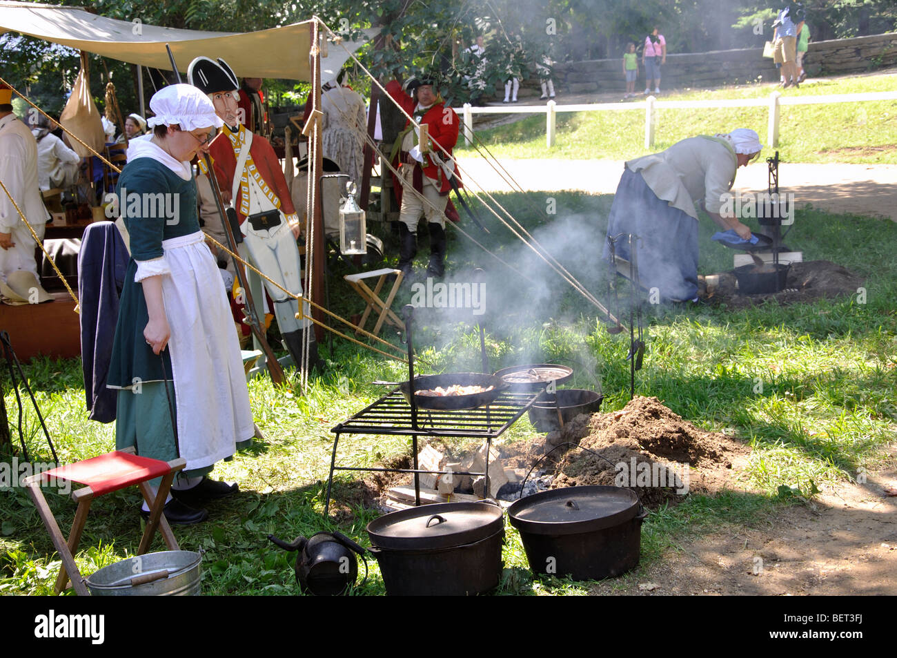 Open fire cooking - costumed American Revolutionary War (1770's) era re-enactment Stock Photo
