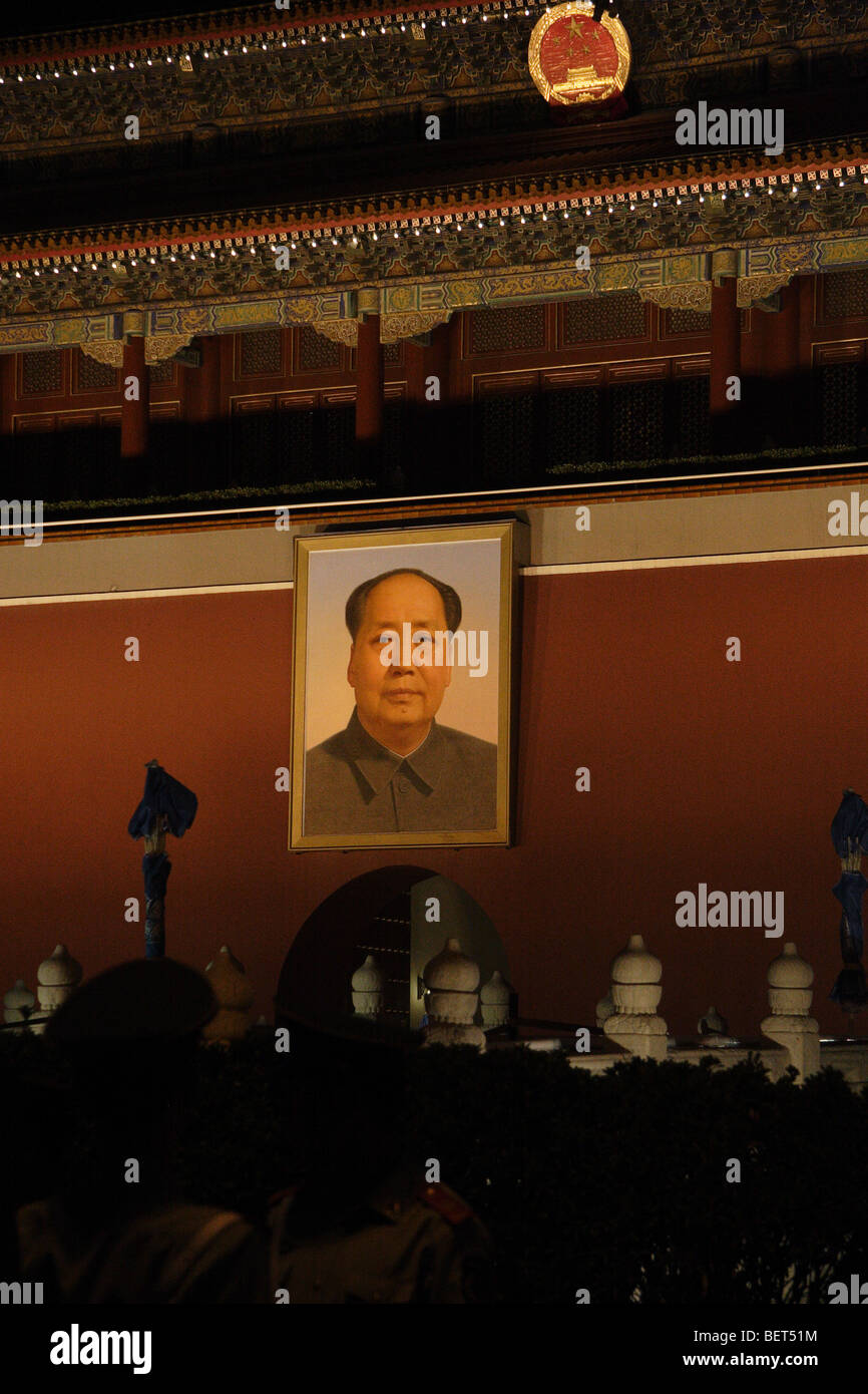 guards in front of mao zedong portrait at the forbidden city Stock Photo