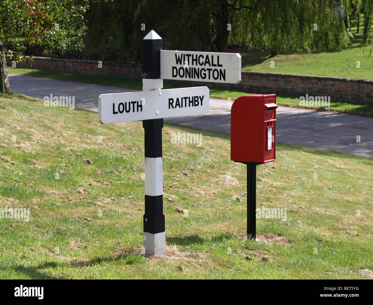 Traditional signpost in the Lincolnshire Wolds for Louth, Raithby ...