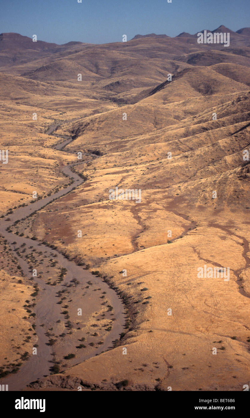 The Cunene River in the Namib desert, Northern Namibia. Angola is on the left hand side. Namibia on the right. Stock Photo