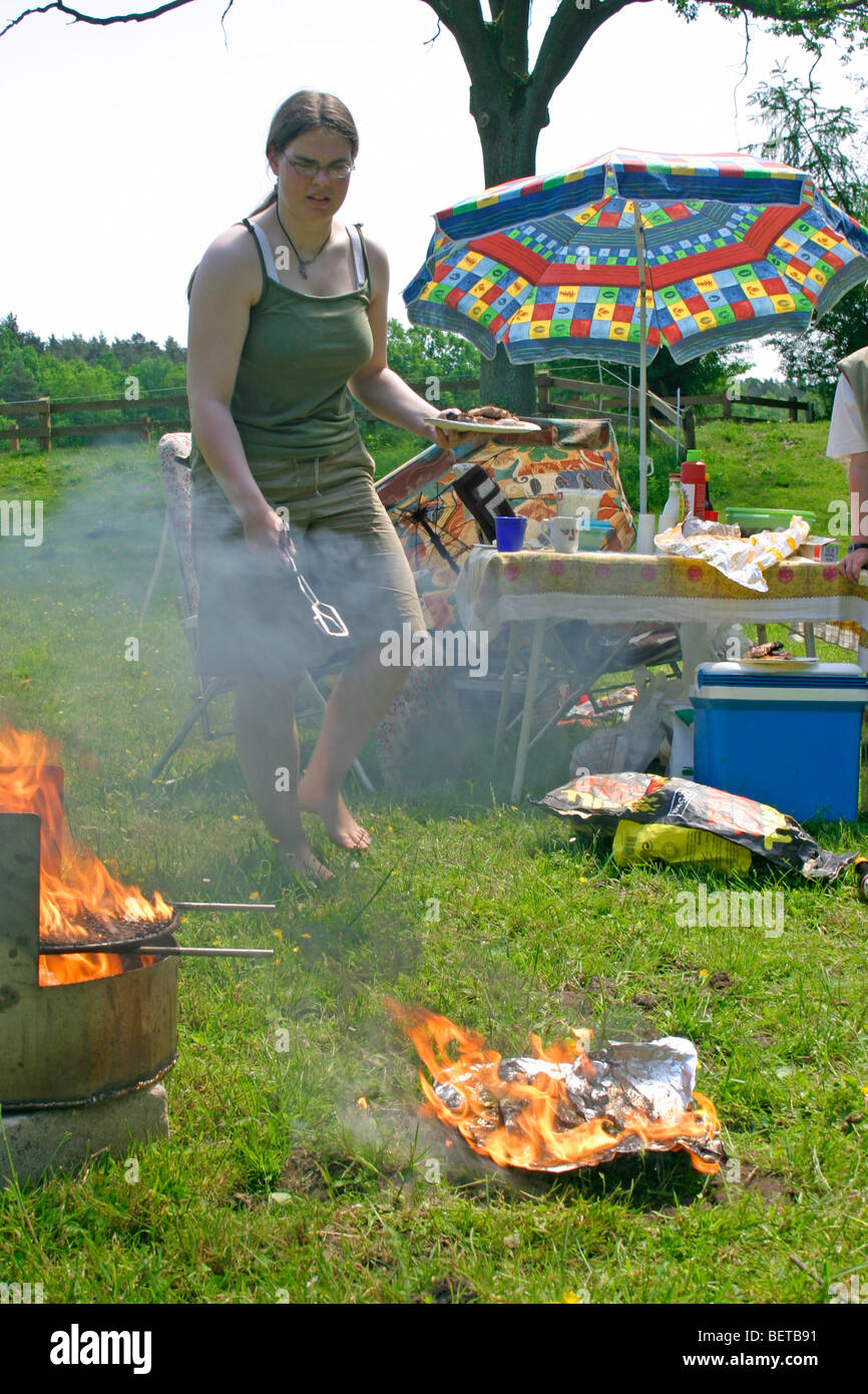 family barbecue has caught fire Stock Photo Alamy
