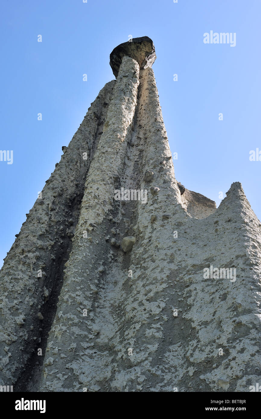Pyramids of Euseigne, Valais / Wallis, Switzerland. Rocks of harder stone stacked on top of conglomerate due to water erosion Stock Photo