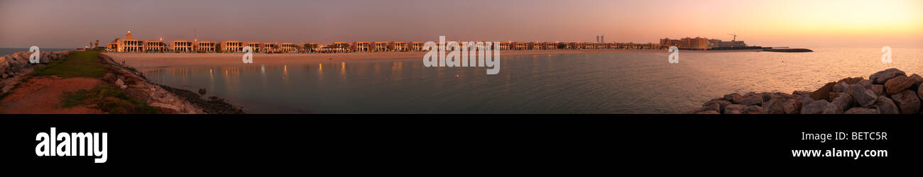 Sunset over the Beach and Bay Waterfront, RAK Stock Photo